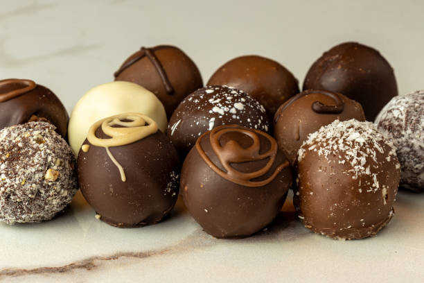 istock chocolate truffles of various flavors 1702840360