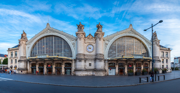 Hamburg, Germany Feb 21 2020: panoramic view from Ernst-Merck-Brücke bridge to Hamburg Central Station. Trains on the platforms on the background of the historical building of the railway station.