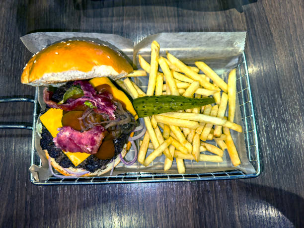 Delicious hamburger with french fries.