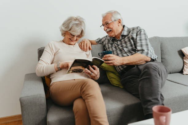 istock Senior Couple Finds Peace in Reading Together 1703044101
