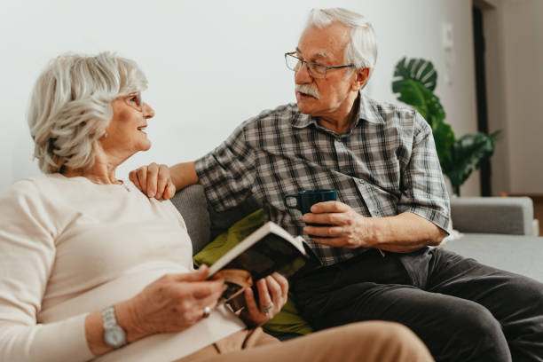 istock Senior Couple Bond Over Their Favorite Books 1703046294