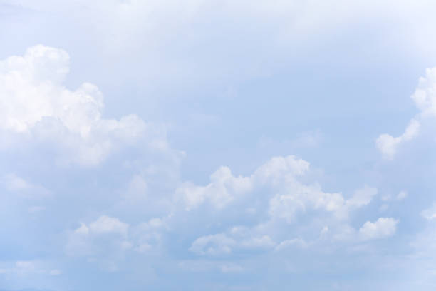 istock Blue sky background and white clouds soft focus, and copy space horizontal shape. 1703050159