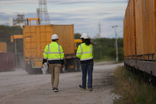 istock A couple of Commercial dock workers discussing the logistics schedule 1703051832
