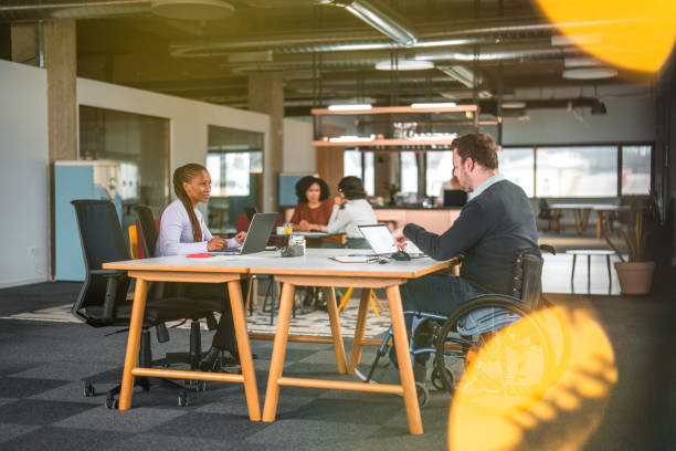 istock Inclusive Co-Working Space With Multiracial Team of People Working 1703130233