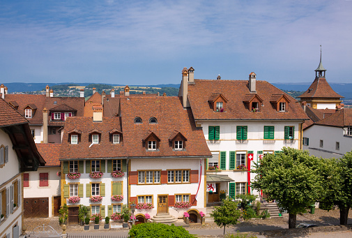 Charming, picturesque homes with clay shingle roofs in the Old Town section of Murten, Switzerland