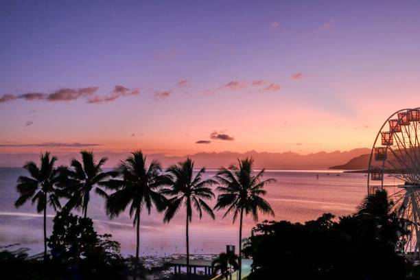 istock Sunrise over Cairns Esplanade, Far North Queensland 1703173679