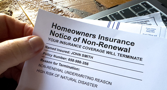 Non-Renewal homeowners insurance letter document close-up