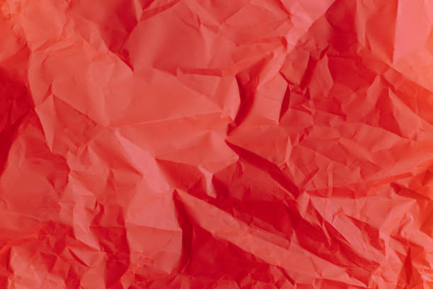 istock Bright red paper background. Concept for holiday. 1703213892