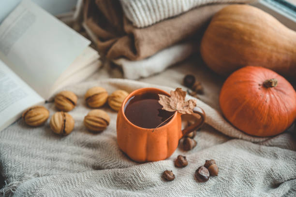 istock Cup of hot tea and a leaf, autumn mood 1703214449