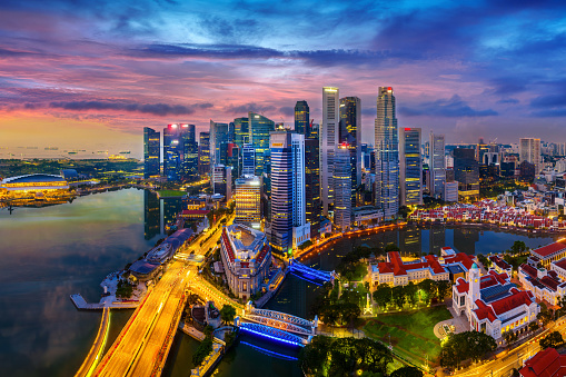 Aerial view of Singapore city at twilight.