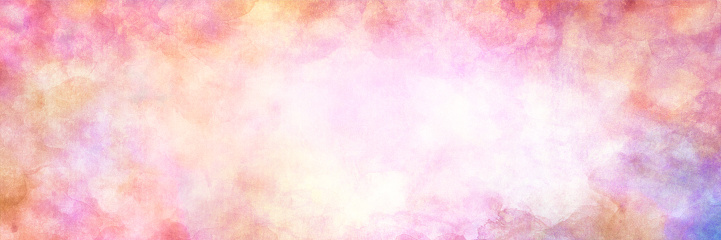 Abstract watercolor background, abstract puffy orange pink red purple and yellow clouds or watercolor blotches texture on border with white cloudy center