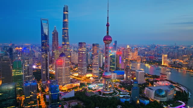 Aerial photography of Shanghai city skyline at night. Creative video for trademark-free advertising