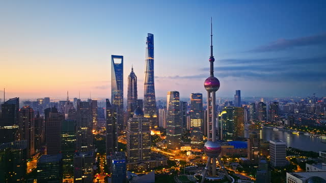 Aerial photography of Shanghai city skyline at night. Creative video for trademark-free advertising