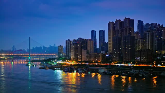 Chongqing city skyline and river night view. Creative video for trademark-free advertising
