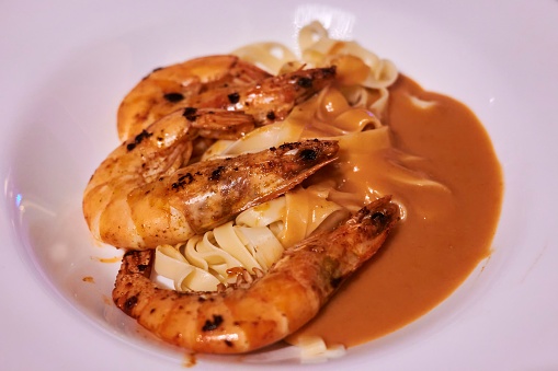 A plate of delicious Asian-style cuisine with shrimp in a sauce