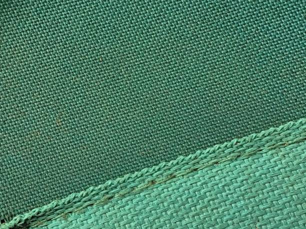 istock Teal Fabric Macro Shot A Captivating Close-Up View 1703392670