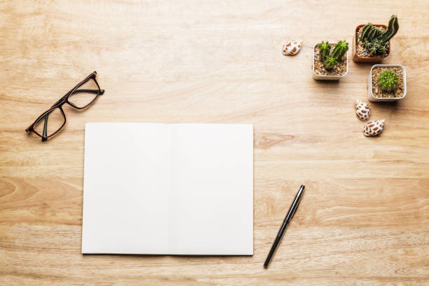 istock Flat lay Desk top view with summer accessories note pad and cactus Creative diary. Travel concept 1703476858