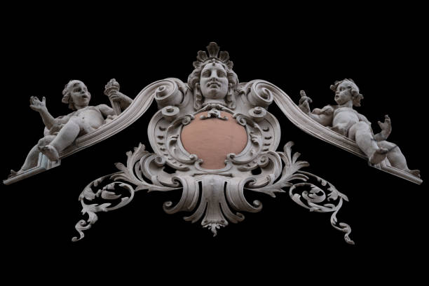 Fragment of an architectural decoration isolated on black background. Copy space. Horizontal image.