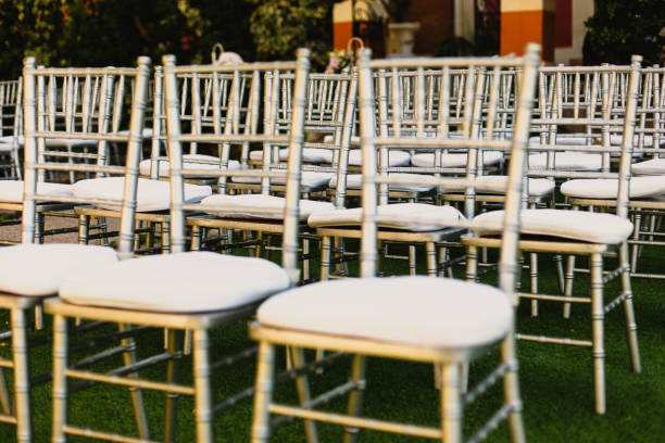 istock Retro empty vintage style wooden chairs for events and weddings 1703500514