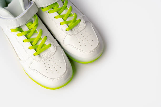 istock Pair of new sneakers isolated on white background 1703531192