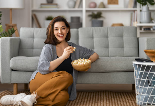 istock woman watching TV 1703556866