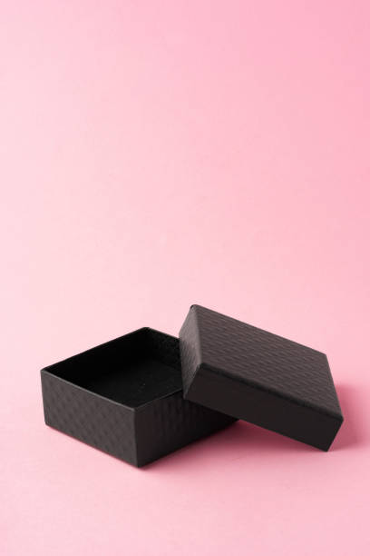 istock Small jewelry box on pink studio background 1703556877