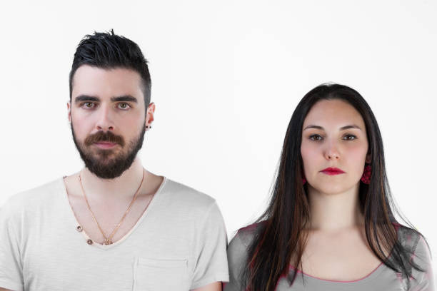 istock Frontal view, man and woman unexpressive 1703561247