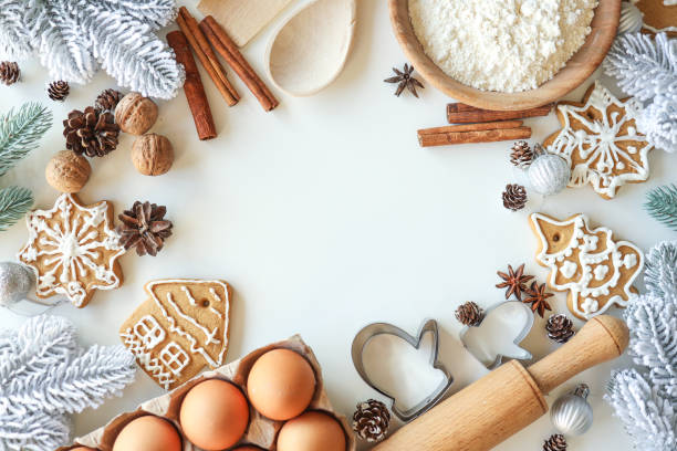 istock Christmas background with place for text. Flour, eggs, cinnamon, form, rocking flat lay top view 1703563488