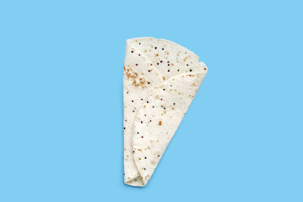 istock Quinoa tortilla wraps on white background 1703563493