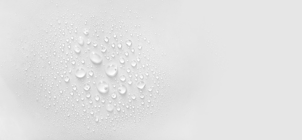 A bar of soap freshly used with soap bubbles on the surface.