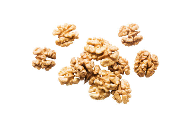 pile Walnut kernel isolated on white background, top view. Flat lay Healthy food concept