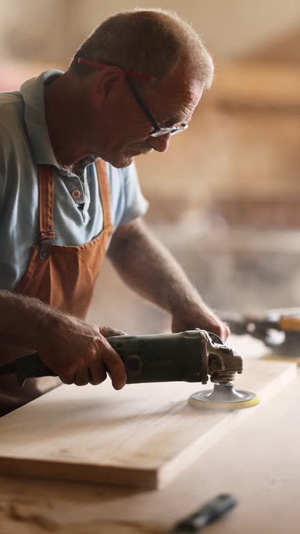 Senior male carpenter working