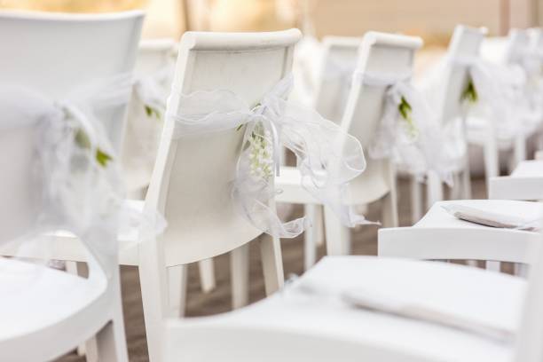 istock Moderm empty style wooden chairs for events and weddings 1703596535