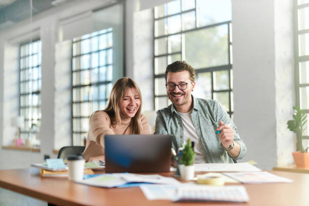 istock Creative colleagues working on plans and laptop in the office. 1703600449
