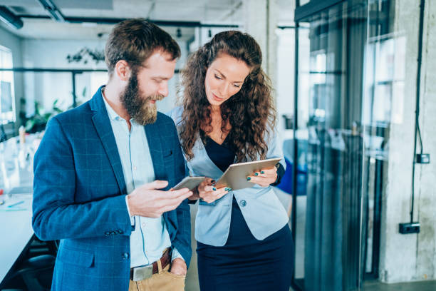 istock Business conversation in the office. 1703627876