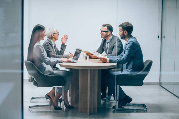 istock Business persons on meeting in the office. 1703628426