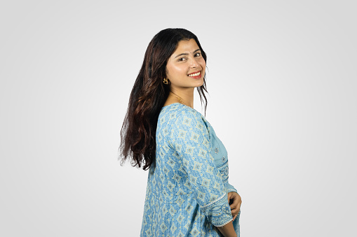 Young Smiling Asian Nepali Indian Housewife giving several best gestures  and poses with greeting