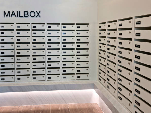 istock Mailbox or post office full of numbers in an apartment building 1703708749