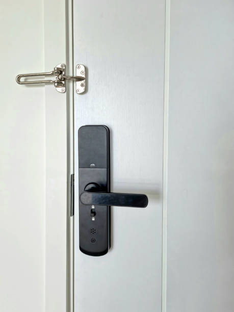 istock Electronic lock on wooden door 1703708750