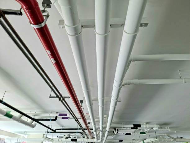 istock Pipes under the building for drainage systems and electrical pipes. 1703708762