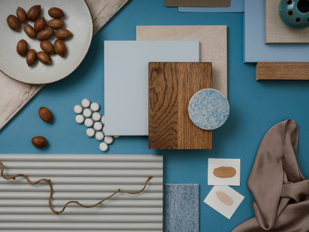 Elegant  flat lay composition in blue, brown and beige color palette with textile and paint samples, lamella panels and tiles. Architect and interior designer moodboard. Top view. Copy space.