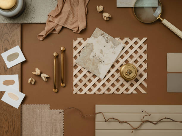 istock Creative flat lay composition in beige and brown color palette with textile and paint samples, lamella panels and tiles. Architect and interior designer moodboard. Top view. Copy space. 1703716889
