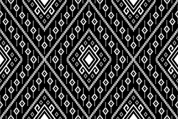 istock Nature vintages cross stitch traditional ethnic pattern paisley flower Ikat background abstract Aztec African 1703721118