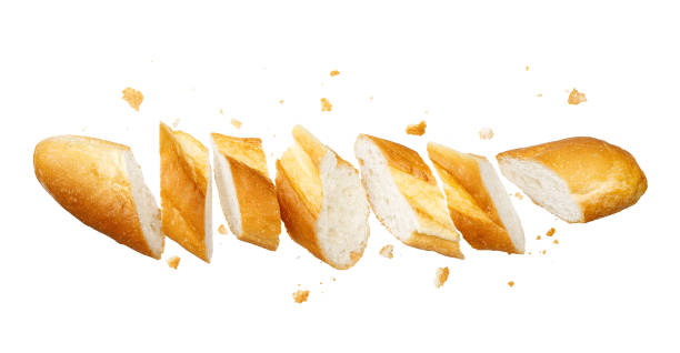 istock Freshly baked baguette with crumbs flying 1703725185