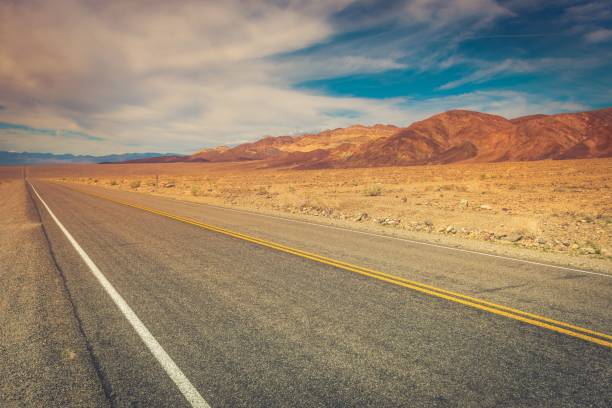 istock Desolate road through Death Valley in California. 1703730743