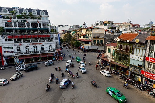 Hanoi, Bac Bo, Vietnam - November 25, 2019: The city center and chaos traffic of Hanoi in Vietnam