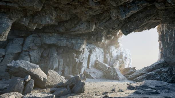 istock Light falls through the entrance to the cave 1703790437