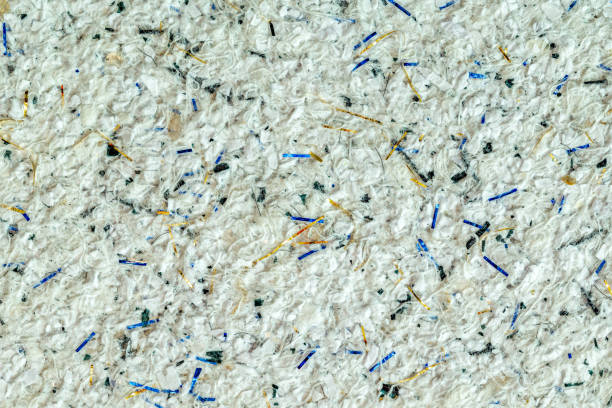 istock Cotton plaster wall . Abstract interior wall decor background. cotton wall coating. Abstract textured liquid wallpaper. Decorative wool plaster texture. cotton decorative plaster to cover wall surface. Moisture regulating 1703790969