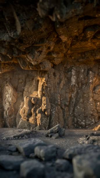 istock The floor of the cave is awash with the setting sun's light. 1703792634