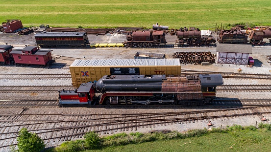Ronks, United States – June 28, 2022: A Drone View of An Antique Steam Locomotive Being Repaired, With it's Outer Shell Removed on a Sunny Summer Day